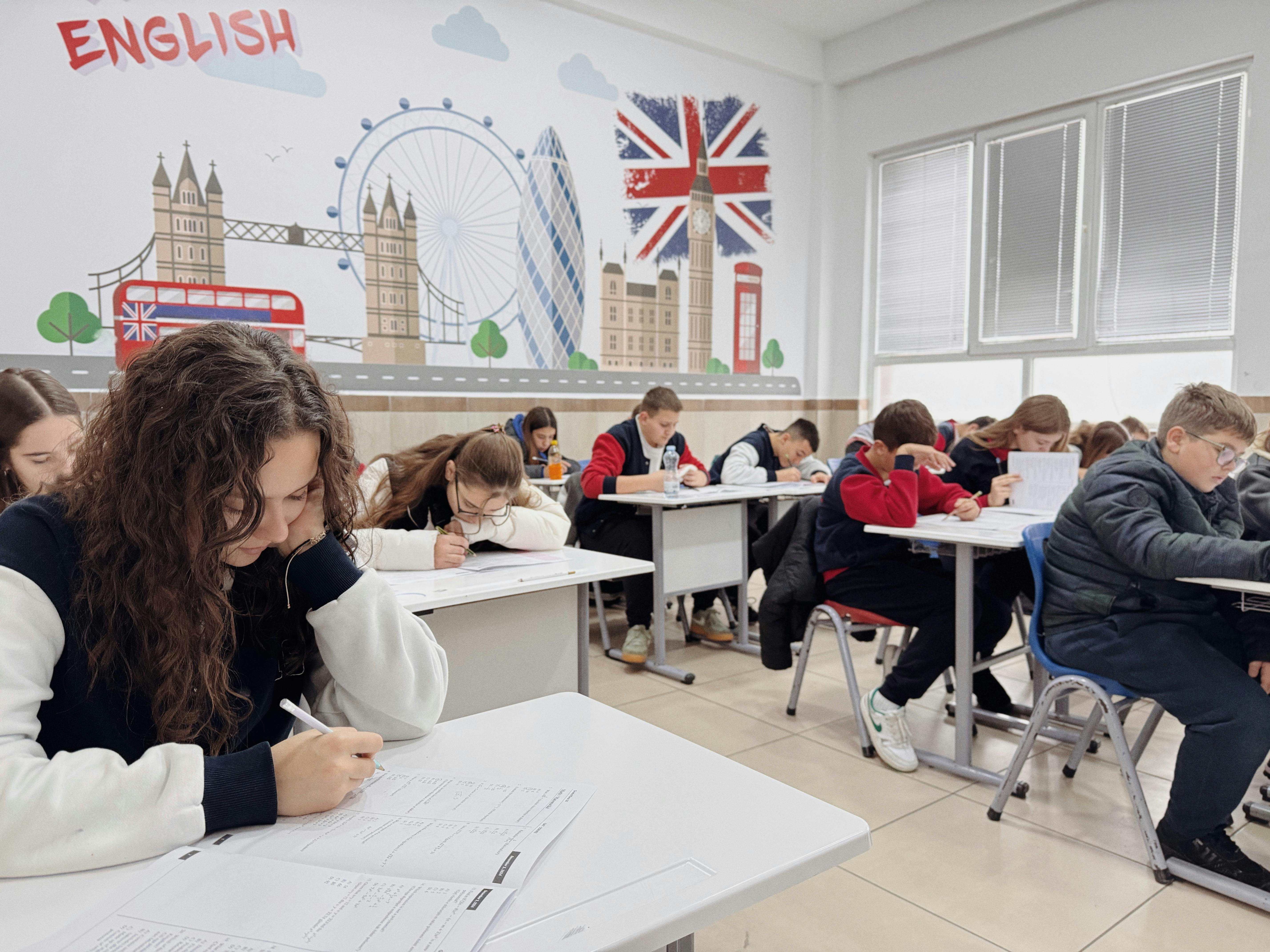 COURSES Students focus on an English class study session in a London-themed classroom.